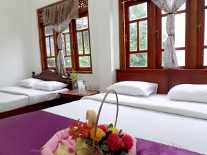 Postel nebo postele na pokoji v ubytování Subash Hotel