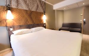 Postel nebo postele na pokoji v ubytování Hotel ibis Dijon Centre Clemenceau