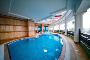 Piscina en o cerca de Retaj Al Rayyan
