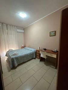 Postel nebo postele na pokoji v ubytování B&B Emmanuel