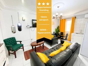 TV a/nebo společenská místnost v ubytování Appartement de Standing AKWA