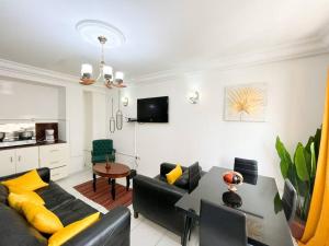 TV a/nebo společenská místnost v ubytování Appartement de Standing AKWA