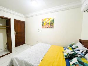 Postel nebo postele na pokoji v ubytování Appartement de Standing AKWA