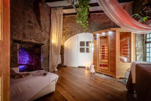 Postel nebo postele na pokoji v ubytování B&B dei Papi Boutique Hotel