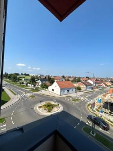 a view of a city street with a road at Apartman JAGODA in Varaždin