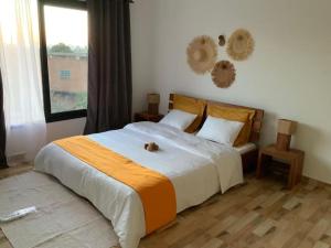 Ένα ή περισσότερα κρεβάτια σε δωμάτιο στο Villa moderne securisee 24H sur 7J