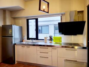 Cucina o angolo cottura di Annong Image Vacation Home