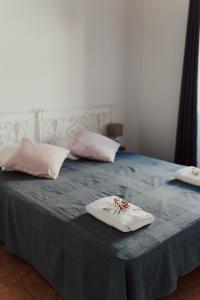 Кровать или кровати в номере Casa Margarida