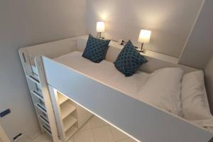 Ένα ή περισσότερα κρεβάτια σε δωμάτιο στο INN pieno centro- appartamento