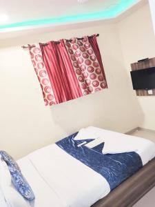 Postel nebo postele na pokoji v ubytování Hotel Golden Galaxy - Santacruz East