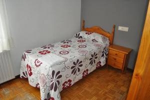 Postel nebo postele na pokoji v ubytování Hostal La Tablada