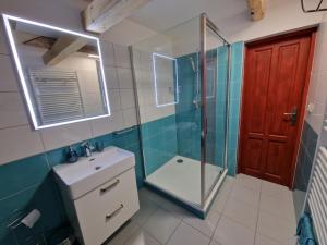 Koupelna v ubytování Apartmán U kostela + 8 fotografií