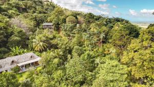 an aerial view of a house on a mountain at The Fort Hostel in Don Diego