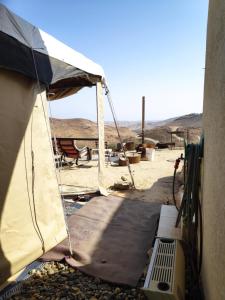 a tent with a view of the desert at Desert's Edge Eco Tent in Arad