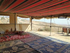 a large tent with a view of the desert at Desert's Edge Eco Tent in Arad