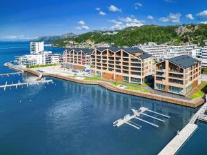 an aerial view of a resort on a body of water at Divine Seaview Terrace in Sandnes