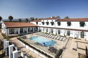 an aerial view of a hotel with a swimming pool at Moxy Santa Barbara in Santa Barbara