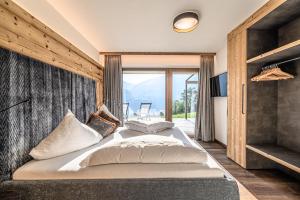 Postel nebo postele na pokoji v ubytování Chalets & Apartments Wachterhof