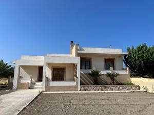 a house in the middle of a street at Luna's Summer House in Kremasti