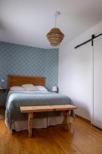 Postel nebo postele na pokoji v ubytování Au coq du bonheur
