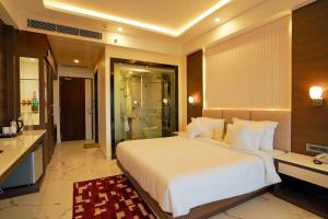 Katil atau katil-katil dalam bilik di Shanti Seaview Resort & Spa