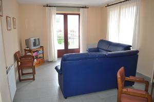 TV a/nebo společenská místnost v ubytování Hostal La Tablada