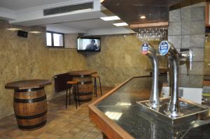 Lounge nebo bar v ubytování Hostal La Tablada