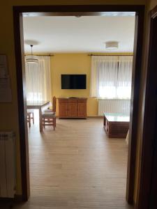 TV a/nebo společenská místnost v ubytování Casa Rural De Mascoras