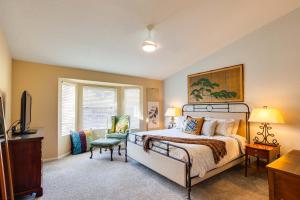 a bedroom with a bed and a television in it at Western Star Ahwatukee home in Phoenix