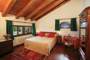 Postel nebo postele na pokoji v ubytování Agriturismo Scacciapensieri