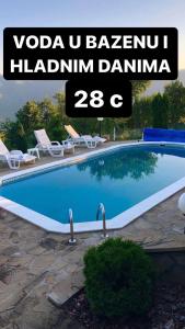 The swimming pool at or close to Etno selo Milanovic - Nonac