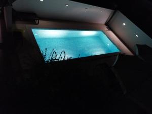 a view of a swimming pool in a room at Apartments Batur in Zadar