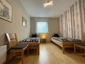 Katil atau katil-katil dalam bilik di Schöne Aussicht Sauerland by Kölbel Familienurlaub mit Hund