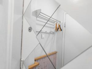 a staircase in a house with white walls at Residential Homes Franzén in Helsinki +27 photos