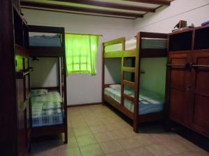 Katil atau katil-katil dalam bilik di Pagalù Hostel