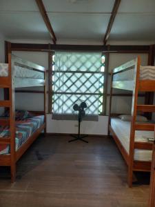 Katil atau katil-katil dalam bilik di Pagalù Hostel