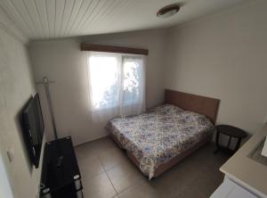 Postel nebo postele na pokoji v ubytování Villa Rain Cesme