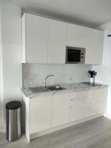 Kuchyň nebo kuchyňský kout v ubytování Apartamento mágico con vistas al mar
