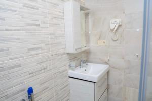Koupelna v ubytování Hotel Leonardo