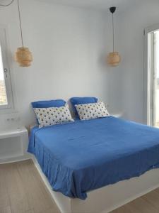 Postel nebo postele na pokoji v ubytování Villa THEROS