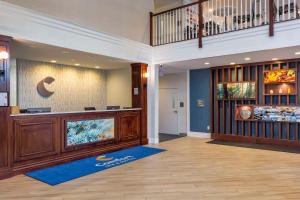 a lobby with a fish tank in a building at Comfort Inn & Suites East Greenbush - Albany in East Greenbush