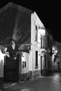 a black and white photo of a building at night at Luxury B&B La Spelunca in Santa Maria Capua Vetere