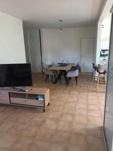 Et tv og/eller underholdning på Grand appartement duplex