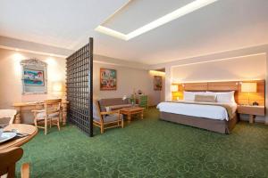 Postel nebo postele na pokoji v ubytování Marriott Tuxtla Gutierrez Hotel