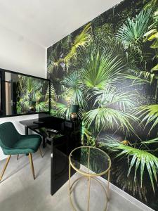 an office with a wall mural of plants at EasyLiving Darmstadt in Darmstadt