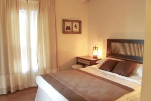 Letto o letti in una camera di B&B Kapì Country
