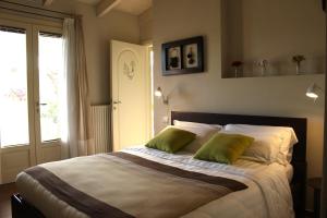 Letto o letti in una camera di B&B Kapì Country