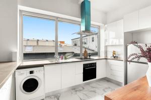 Η κουζίνα ή μικρή κουζίνα στο Inner West Delight l Studio by St Peters Station