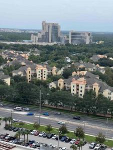 a view of a city with a parking lot and buildings at Big Pool, stunning Lakeview, Sunrise, Disney #1907 in Orlando