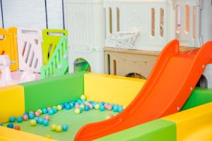 a play room with a slide and balls at Crowne Plaza Kunshan, an IHG Hotel in Kunshan